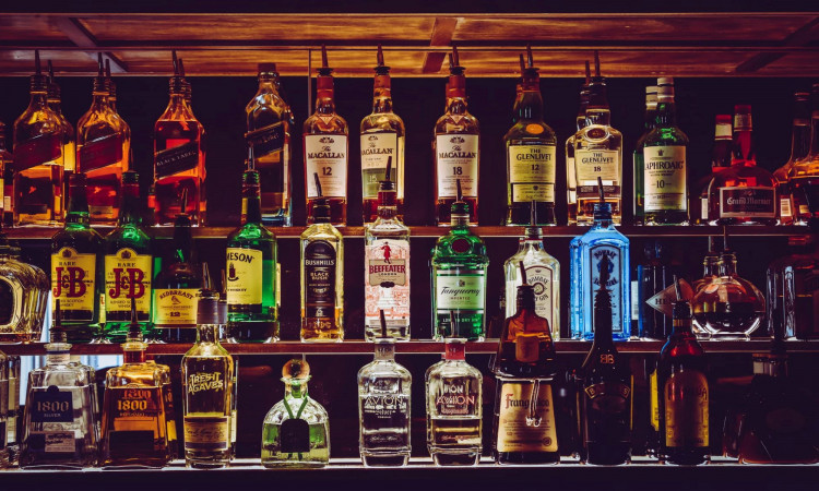 Assorted wine bottles.