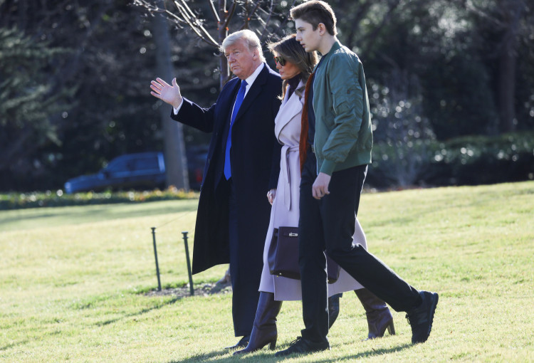 U.S. President Donald Trump and First Lady Melania Trump walk with their son Barron to the Marine One helicopter to depart for travel to Florida from the South Lawn of the White House in Washington, U.S., January 17, 2020. REUTERS/Leah Millis
