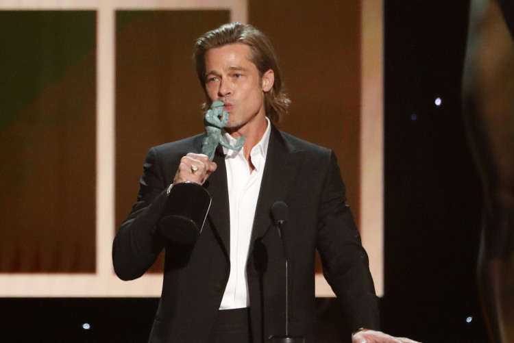 26th Screen Actors Guild Awards - Show - Los Angeles, California, U.S., January 19, 2020 - Brad Pitt accepts the award for Outstanding Performance by a Male Actor in a Supporting Role for "Once Upon A Time in Hollywood." REUTERS/Mario Anzuoni