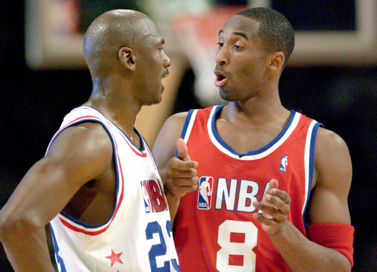FILE PHOTO: Jordan and Bryant chat during NBA All-Star Game in Atlanta
