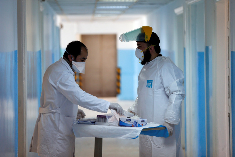 Members of the medical staff work at a new section specialised in receiving any person who may have been infected with coronavirus