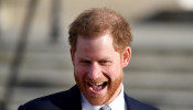 FILE PHOTO: Britain's Prince Harry attends a rugby event at Buckingham Palace gardens in London