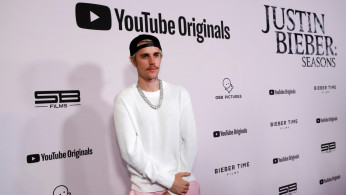 Singer Justin Bieber poses at the premiere for the documentary television series 