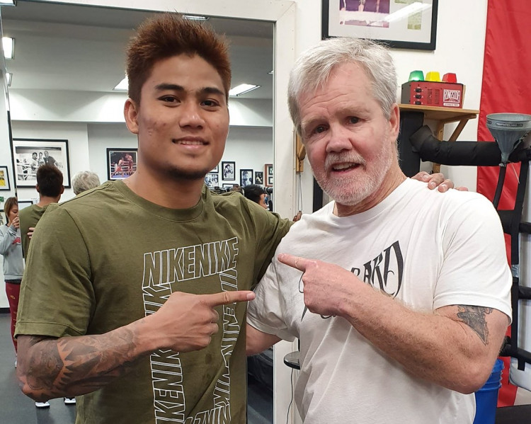 Mark Magsayo (L) with Freddie Roach (R) at the Wild Card Boxing Club