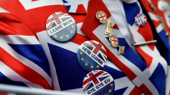 Pro-Brexit pins are seen on supporter's jacket at Parliament Square, on Brexit day in London