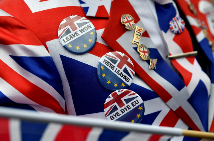 Pro-Brexit pins are seen on supporter's jacket at Parliament Square, on Brexit day in London
