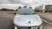 A modified Nissan Leaf driverless car is seen parked outside Nissan's Technical Centre in Cranfield