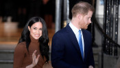 FILE PHOTO: Britain's Prince Harry and his wife Meghan, Duchess of Sussex, leave Canada House in London, Britain January 7, 2020. REUTERS/Toby Melville/File Photo