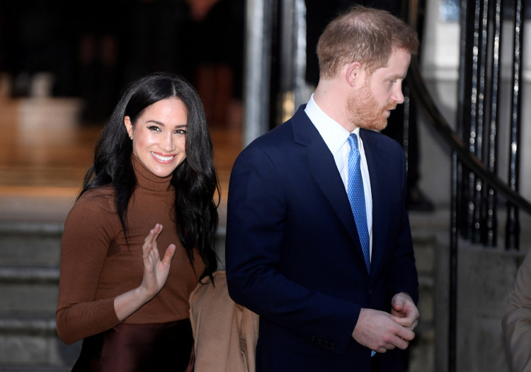 FILE PHOTO: Britain's Prince Harry and his wife Meghan, Duchess of Sussex, leave Canada House in London, Britain January 7, 2020. REUTERS/Toby Melville/File Photo