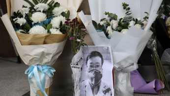 A makeshift memorial for Li Wenliang, a doctor who issued an early warning about the coronavirus outbreak before it was officially recognized