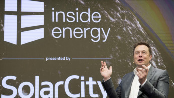 FILE PHOTO: Elon Musk, Chairman of SolarCity and CEO of Tesla Motors, speaks at SolarCity?s Inside Energy Summit in Midtown, New York