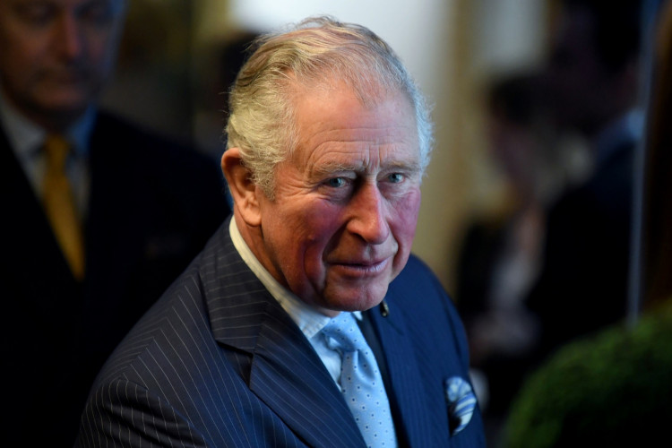 Britain's Prince Charles looks on during a tour to the Cabinet Office building in London