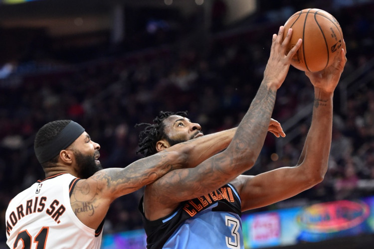 LA Clippers forward Marcus Morris Sr. (31) defends Cleveland Cavaliers center Andre Drummond (3)