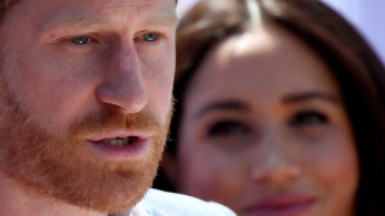 FILE PHOTO: Britain's Prince Harry and Meghan visit South Africa