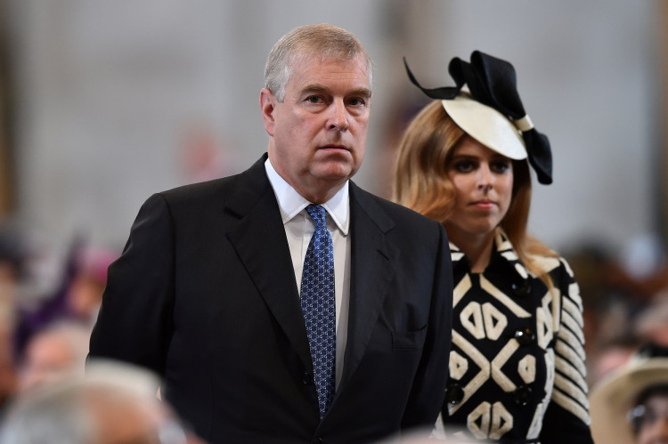 FILE PHOTO: Britain's Prince Andrew, and Princess Beatrice arrive for a service of thanksgiving for Queen Elizabeth's 90th birthday at St Paul's Cathedral in London