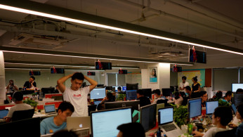 Employees work at DingTalk office, an offshoot of Alibaba Group Holding Ltd, in Hangzhou, Zhejiang province, China July 20, 2018. Picture taken July 20, 2018. 