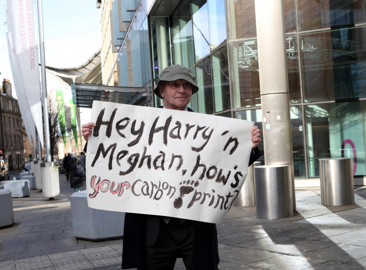 A man stands outside the EICC where Prince Harry was attending a summit on sustainable and ethical tourism in Edinburgh