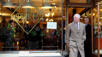 Britain's Prince Charles visits the town of Pontypridd affected by recent floods in Wales
