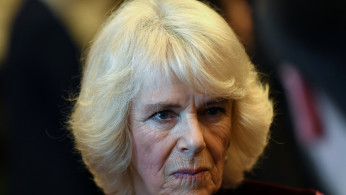 Britain's Camilla, Duchess of Cornwall looks on during a tour to the Cabinet Office building in London