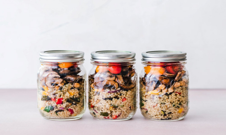 Three mason jars inlined in the table.