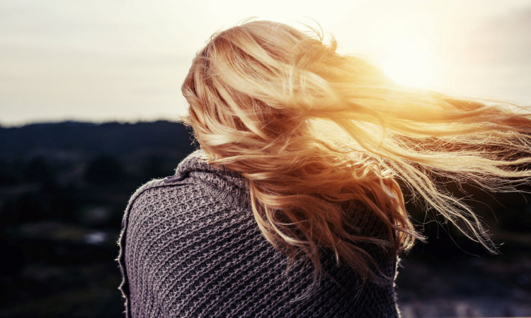 Woman showing her hair.