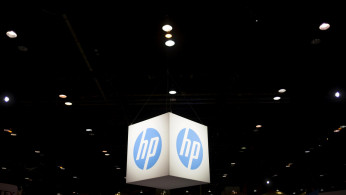 The Hewlett-Packard (HP) logo is seen as part of a display at the Microsoft Ignite technology conference in Chicago, Illinois 
