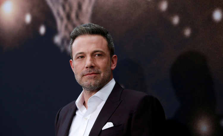 FILE PHOTO: Cast member Ben Affleck poses at the premiere for the film "The Way Back" in Los Angeles, California, U.S., March 1, 2020. REUTERS/Mario Anzuoni/File Photo