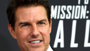 FILE PHOTO: Actor Tom Cruise poses for photographers as he arrives on the red carpet for the premiere of Mission:Impossible-Fallout, at the Smithsonian's National Air and Space Museum, in Washington, U.S., July 22, 2018. REUTERS/Mike Theiler/File Photo