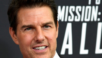 FILE PHOTO: Actor Tom Cruise poses for photographers as he arrives on the red carpet for the premiere of Mission:Impossible-Fallout, at the Smithsonian's National Air and Space Museum, in Washington, U.S., July 22, 2018. REUTERS/Mike Theiler/File Photo