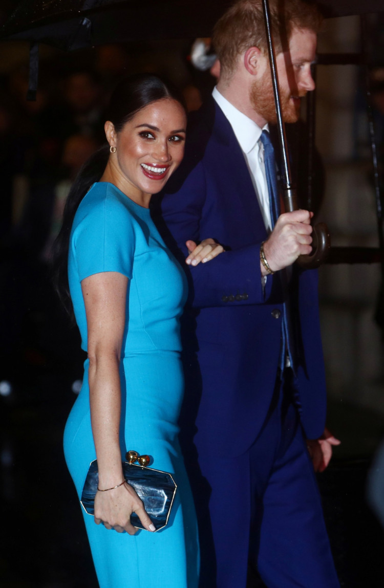 Britain's Prince Harry and his wife Meghan