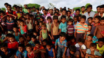 Rohingya Muslims gather together at a traditional wrestling festival at Kyaukpannu village in Maungdaw, northern Rakhine state 