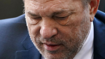 FILE PHOTO: Film producer Harvey Weinstein arrives at the New York Criminal Court during his ongoing sexual assault trial in the Manhattan borough of New York City