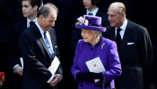 FILE PHOTO: David Armstrong-Jones speak to Britain's Queen Elizabeth and Prince Philip as they leave a Service of Thanksgiving for the life and work of Lord Snowdon at Westminster Abbey in London