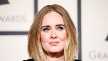 Singer Adele arrives at the 58th Grammy Awards in Los Angeles,