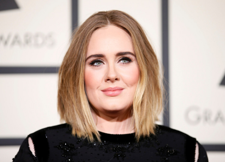 Singer Adele arrives at the 58th Grammy Awards in Los Angeles,