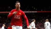FILE PHOTO: Manchester United's Cristiano Ronaldo celebrates scoring his team's second goal in the 79th minute of their 3-0 victory over Liverpool in the Premier League