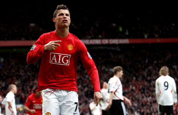 FILE PHOTO: Manchester United's Cristiano Ronaldo celebrates scoring his team's second goal in the 79th minute of their 3-0 victory over Liverpool in the Premier League