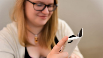 Girl Holding a Smartphone 