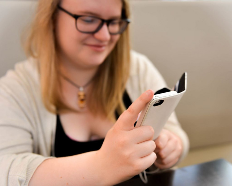 Girl Holding a Smartphone 