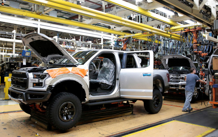 A Ford 2018 F-150 pick-up truck moves down the assembly line at Ford's Dearborn Truck Plant 
