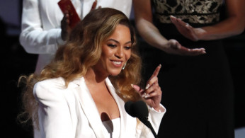 Beyonce reacts after winning the entertainer of the year award