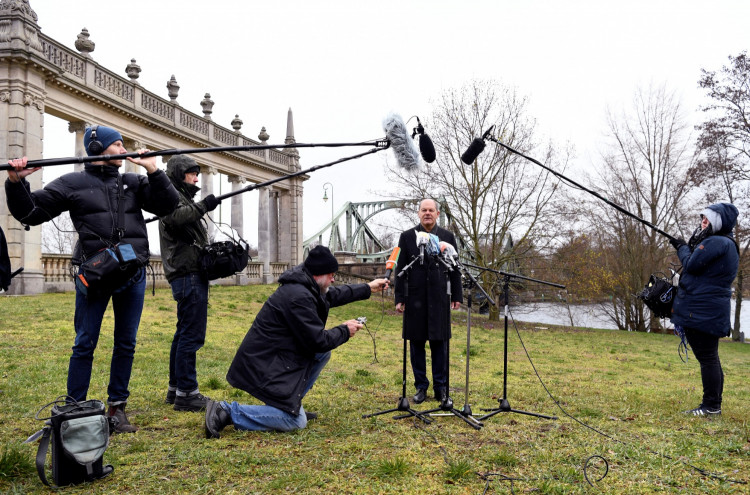 Finance Minister Olaf Scholz addresses the media, during the coronavirus disease (COVID-19) outbreak, near the Glienicke Bridge in Potsdam, Germany