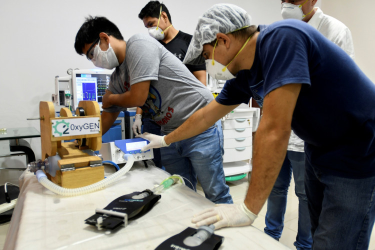 Volunteers work on manufacturing ventilators for use during the coronavirus disease (COVID-19) outbreak, in Santa Cruz