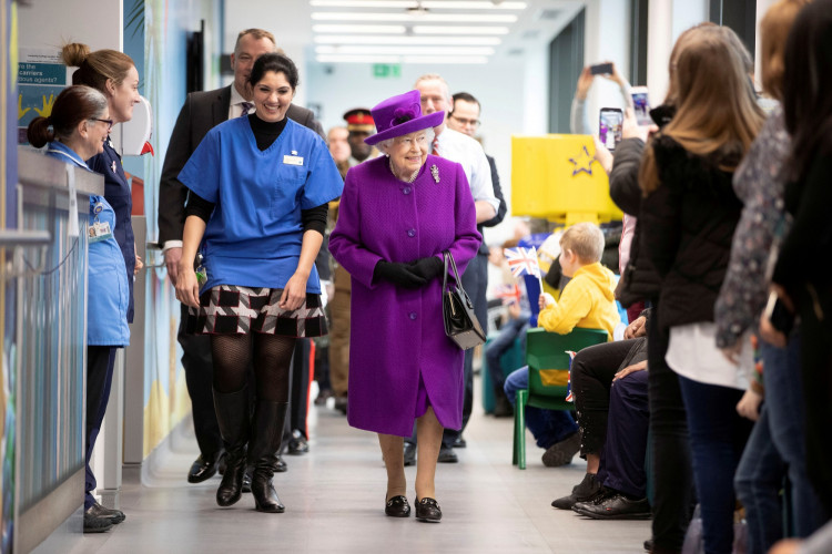 FILE PHOTO: Britain's Queen Elizabeth visits the Royal National ENT & Eastman Dental Hospitals