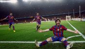 FILE PHOTO: Barcelona's Messi celebrates after scoring against Arsenal during their Champions League quarter-final soccer match in Barcelona