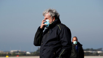 Michele Emiliano, President of the Puglia Region, wears a protective mask