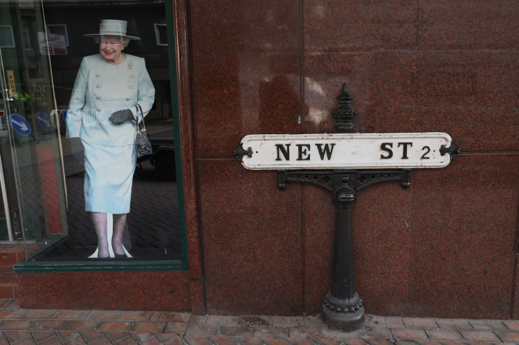 A cut-out image of Britain's Queen Elizabeth is seen on New Street