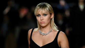 FILE PHOTO: Miley Cyrus presents a creation from the Marc Jacobs Fall/Winter 2020 collection during New York Fashion Week