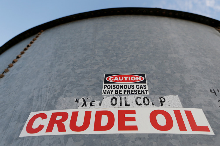FILE PHOTO: FILE PHOTO: A sticker reads crude oil on the side of a storage tank in the Permian Basin