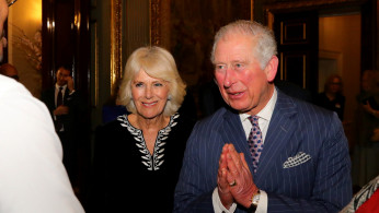 FILE PHOTO: Britain's Prince Charles and Camilla, Duchess of Cornwall attend the Commonwealth Reception at Marlborough House, in London